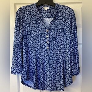 Blue tile patterned empire style top with adjustable cuffs.